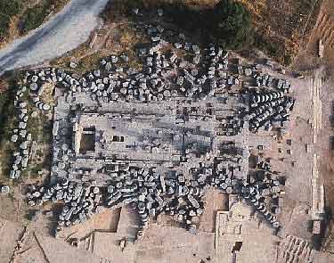 Aerial view of the Temple of Zeus in Ancient Nemea, built in 330 B.C. The column drums, averaging 2.5 tons each, can be seen scattered around the temple. UC Berkeley researchers are leading the effort to reconstruct the temple's columns. Photo courtesy of Nemea Excavations Archive, UC Berkeley
