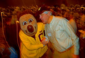 Oski and alum at party
