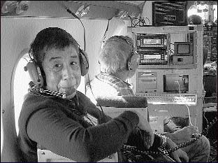 Journalism Professor William Drummond in a plane