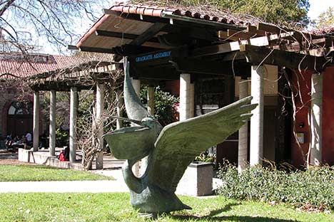 Building with large pelican sculpture in front